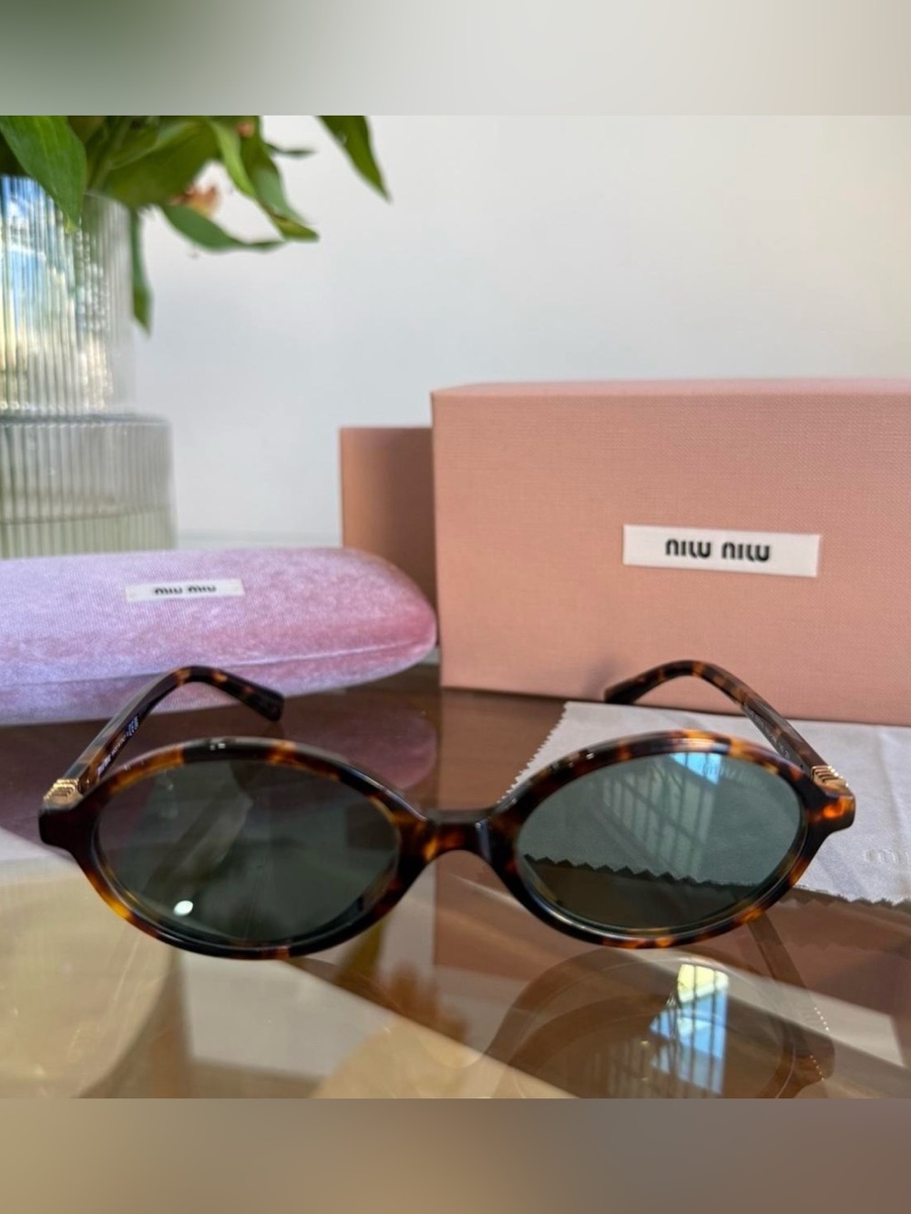 Miu Miu Tortoiseshell Oval Sunglasses